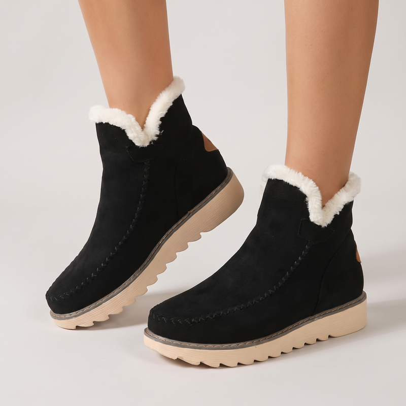 Gaia leather flats in black, worn