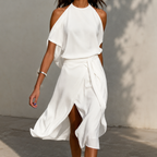 Madonna halter neck asymmetric midi dress in black