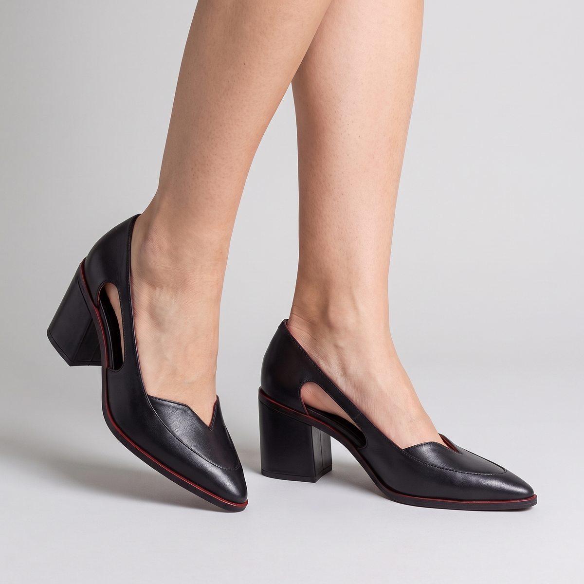 Maia heeled sandals in black, worn