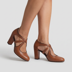 Ophelie block heel sandals in brown, worn