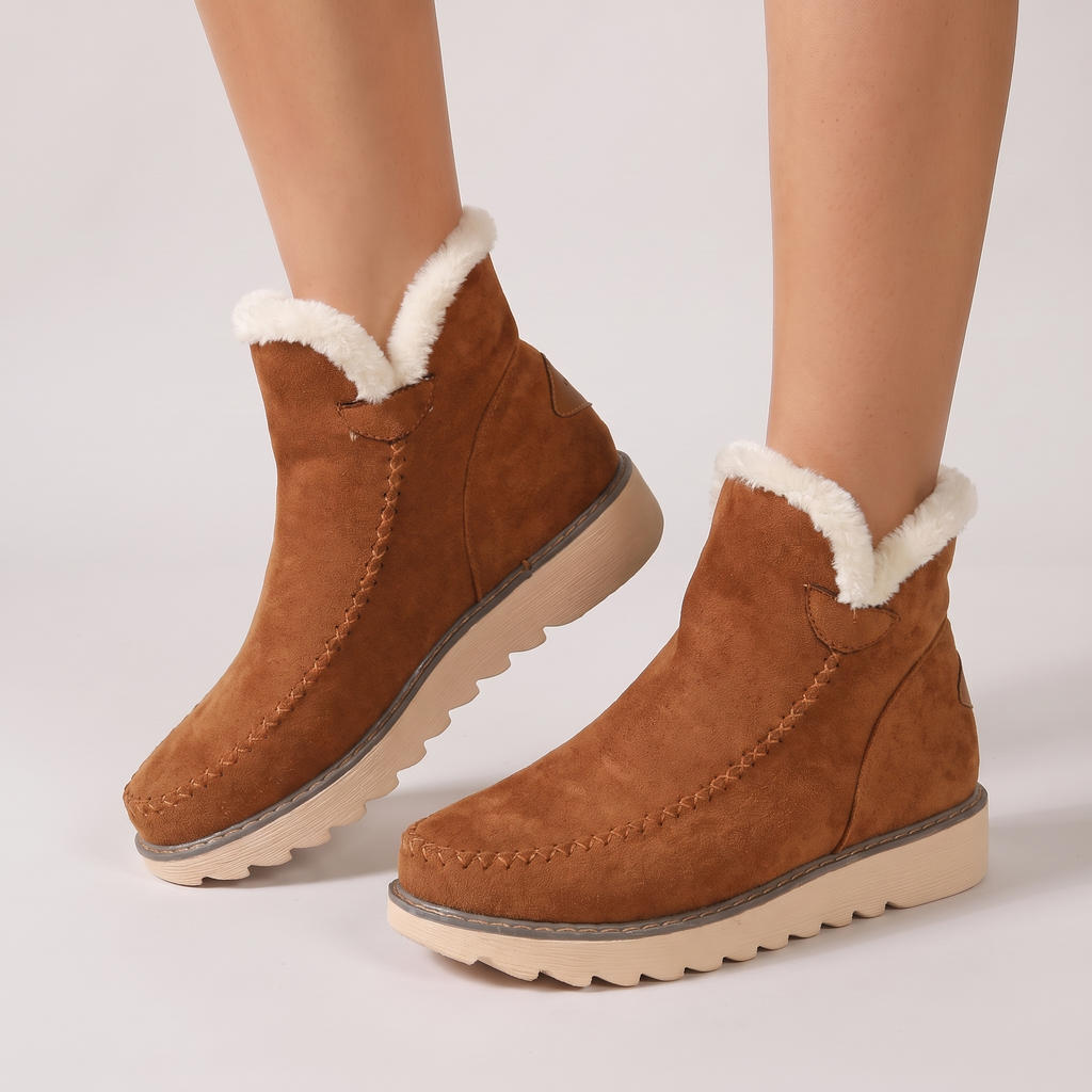 Gaia leather flats in chestnut brown, worn